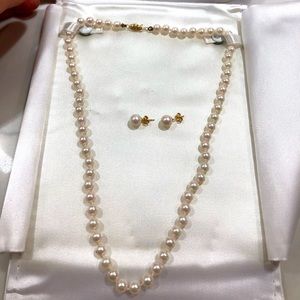 Freshwater Pearl Necklace and Earrings from Damiani Jewellers